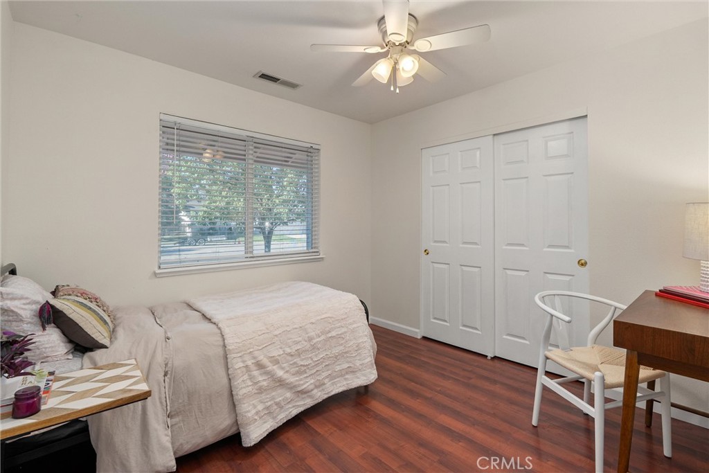 3 Cardiff Court Chico, CA 95973 - Photo 21 of 25 a bedroom with a bed and a window