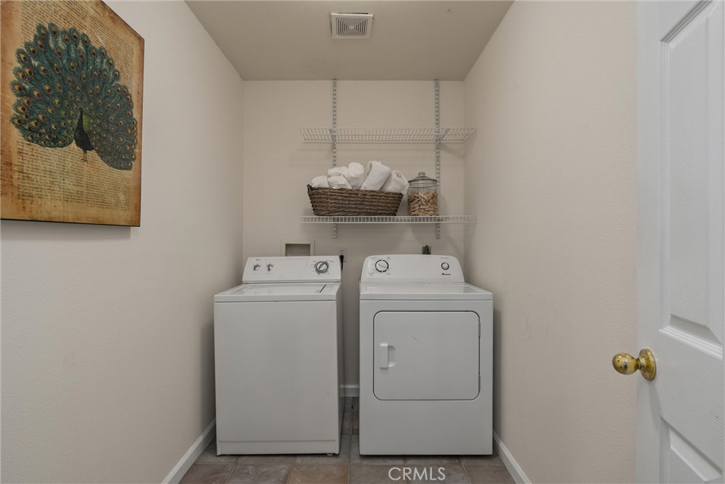3 Cardiff Court Chico, CA 95973 - Photo 23 of 25 a utility room with dryer and washer