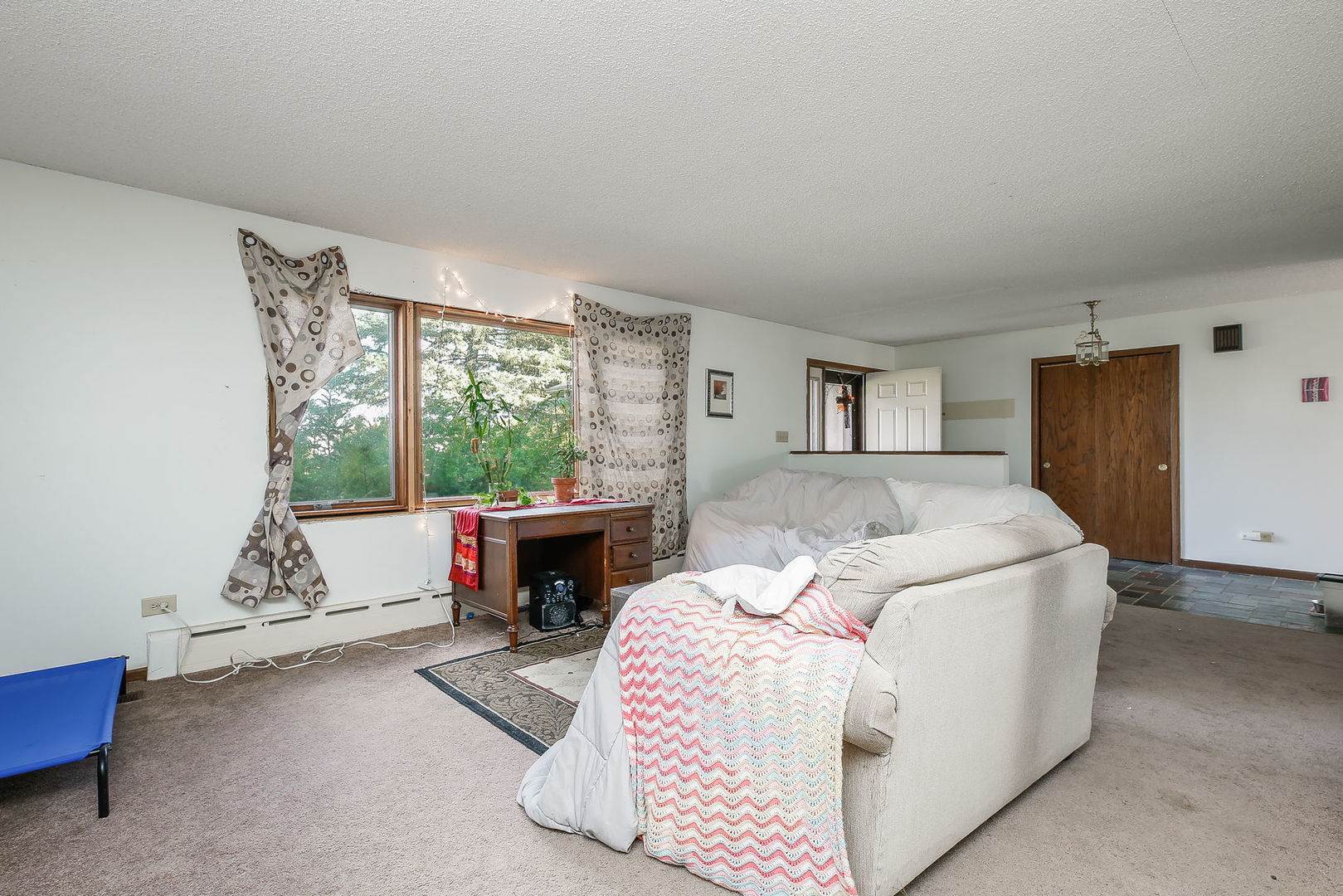 2011 Wagner Road Batavia, IL 60510 - Photo 13 of 29 a bedroom with a bed and a couch