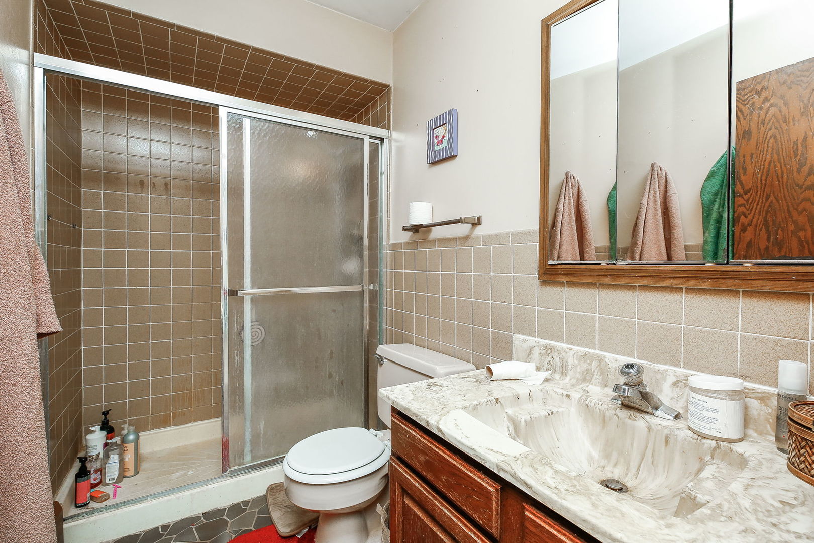 2011 Wagner Road Batavia, IL 60510 - Photo 14 of 29 a bathroom with a granite countertop sink a toilet and shower