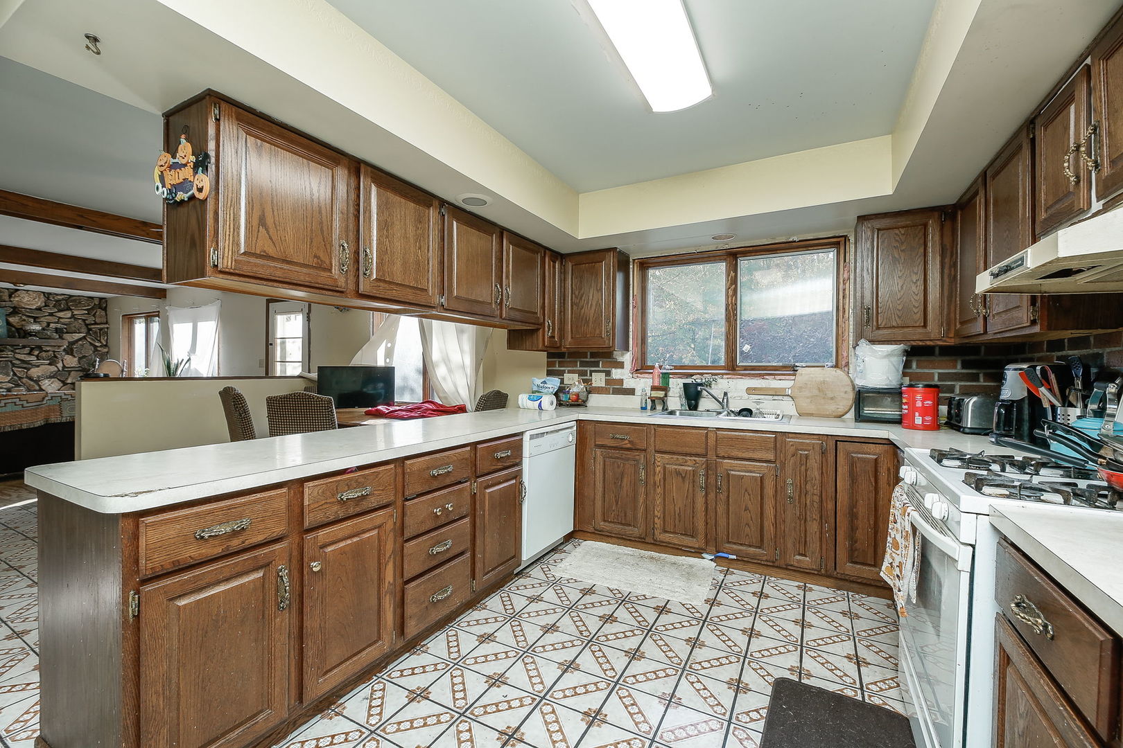 2011 Wagner Road Batavia, IL 60510 - Photo 3 of 29 a kitchen with stainless steel appliances granite countertop a sink stove and cabinets