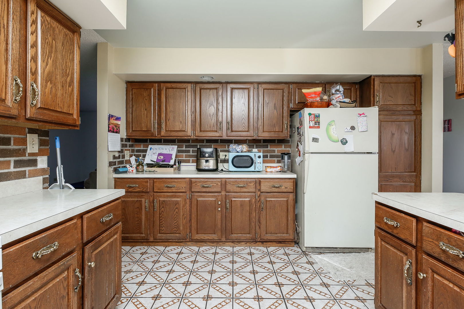 2011 Wagner Road Batavia, IL 60510 - Photo 5 of 29 a kitchen with stainless steel appliances a refrigerator sink and cabinets