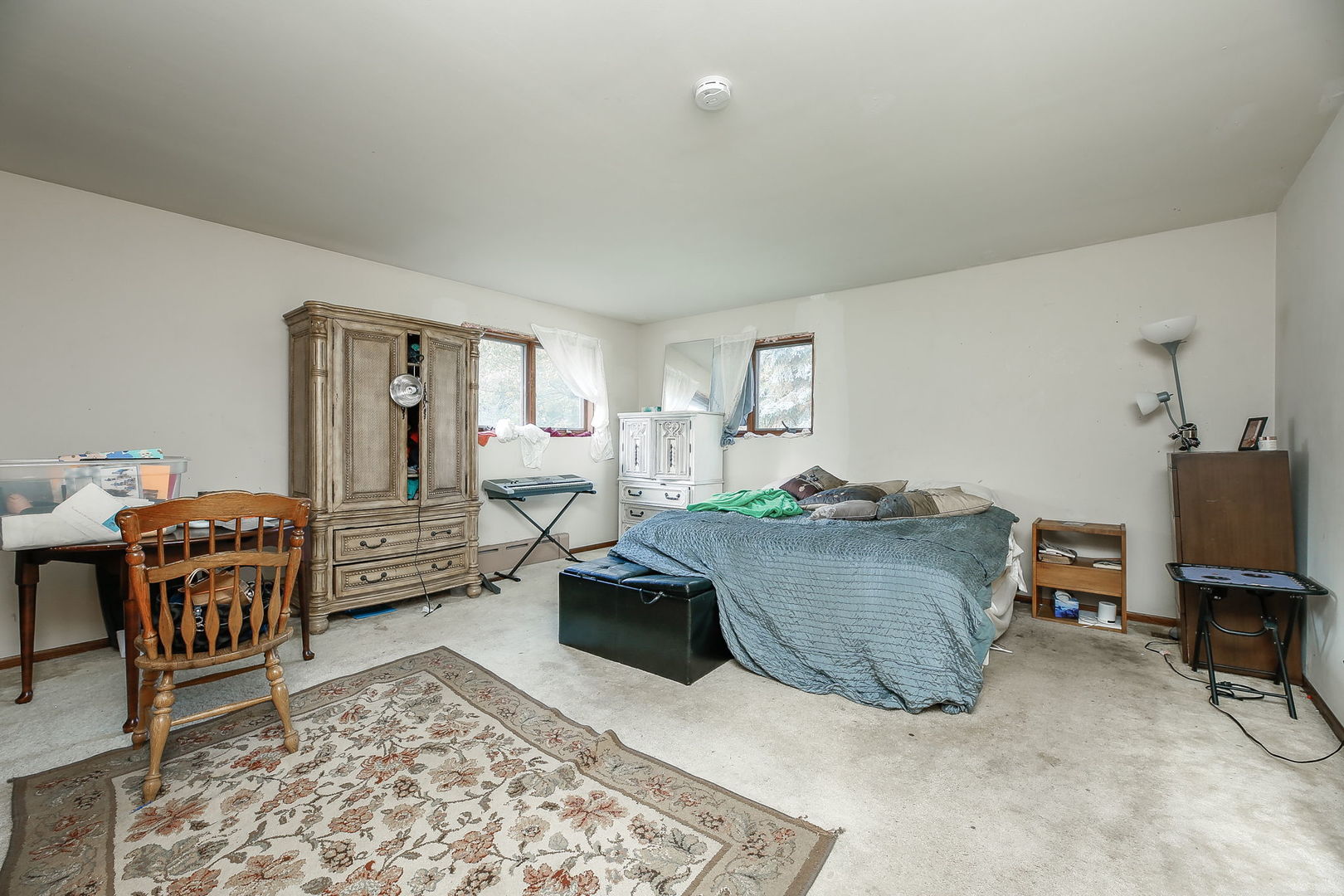 2011 Wagner Road Batavia, IL 60510 - Photo 7 of 29 a living room with furniture a rug and a table