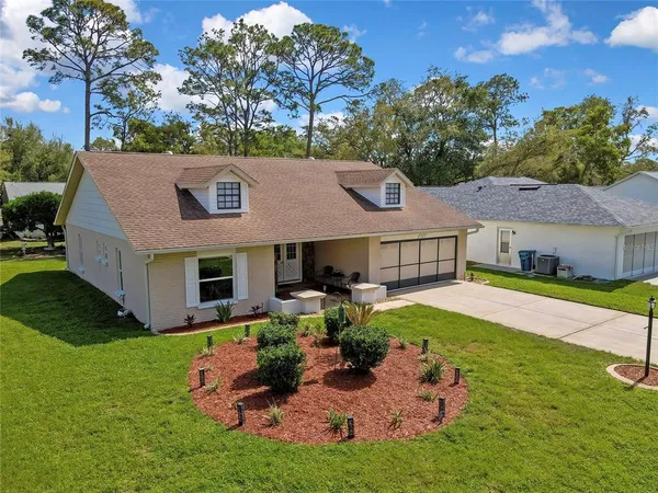 $349,900 | 6433 Lost Tree Lane, Spring Hill, FL 34606