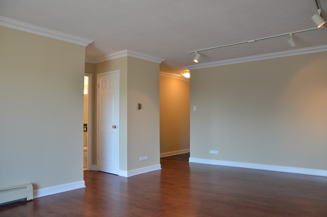1567 Ridge Avenue, Unit 503 Evanston, IL 60201 - Photo 3 of 17 a view of an empty room with wooden floor