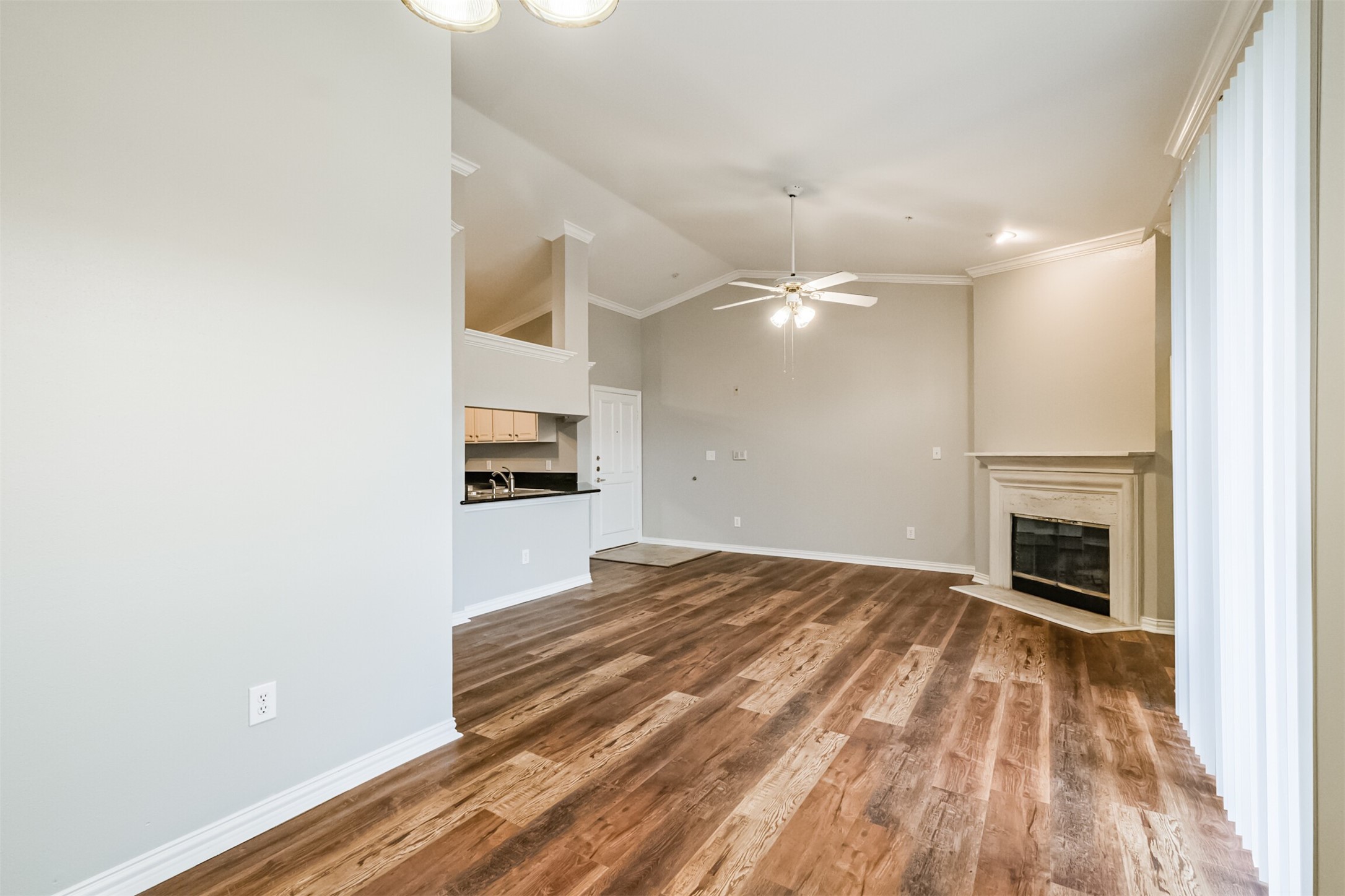 2111 Welch Street, Unit B304 Houston, TX 77019 - Photo 5 of 37 a bedroom with a bed and a fireplace