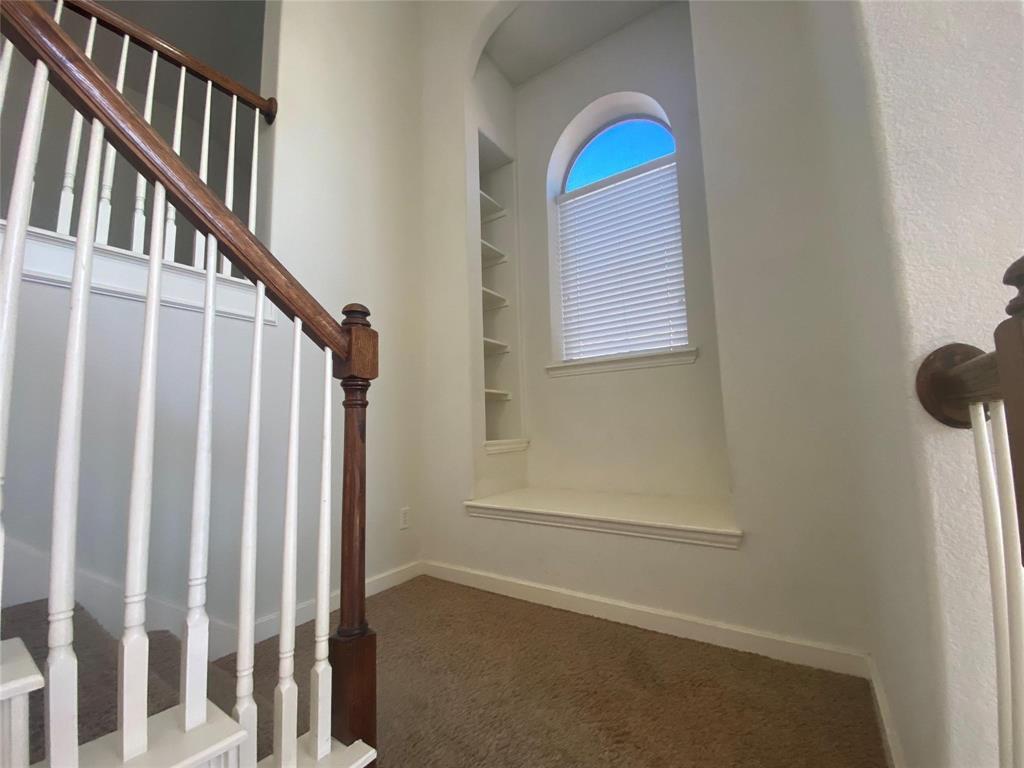 612 Catalpa Road Fort Worth, TX 76131 - Photo 18 of 26 a view of staircase with rug