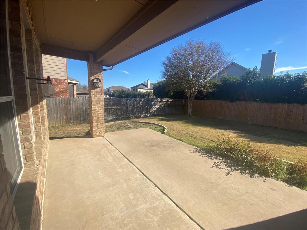 612 Catalpa Road Fort Worth, TX 76131 - Photo 25 of 26 a view of a backyard of a house