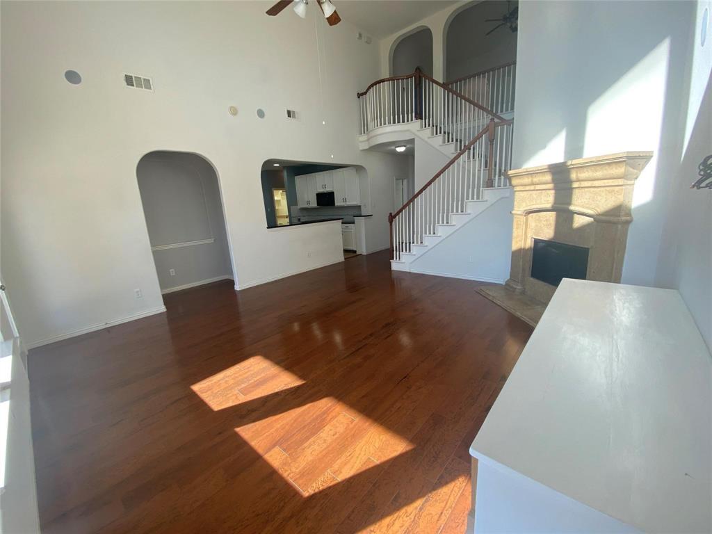 612 Catalpa Road Fort Worth, TX 76131 - Photo 10 of 26 a view of entryway and hall with wooden floor