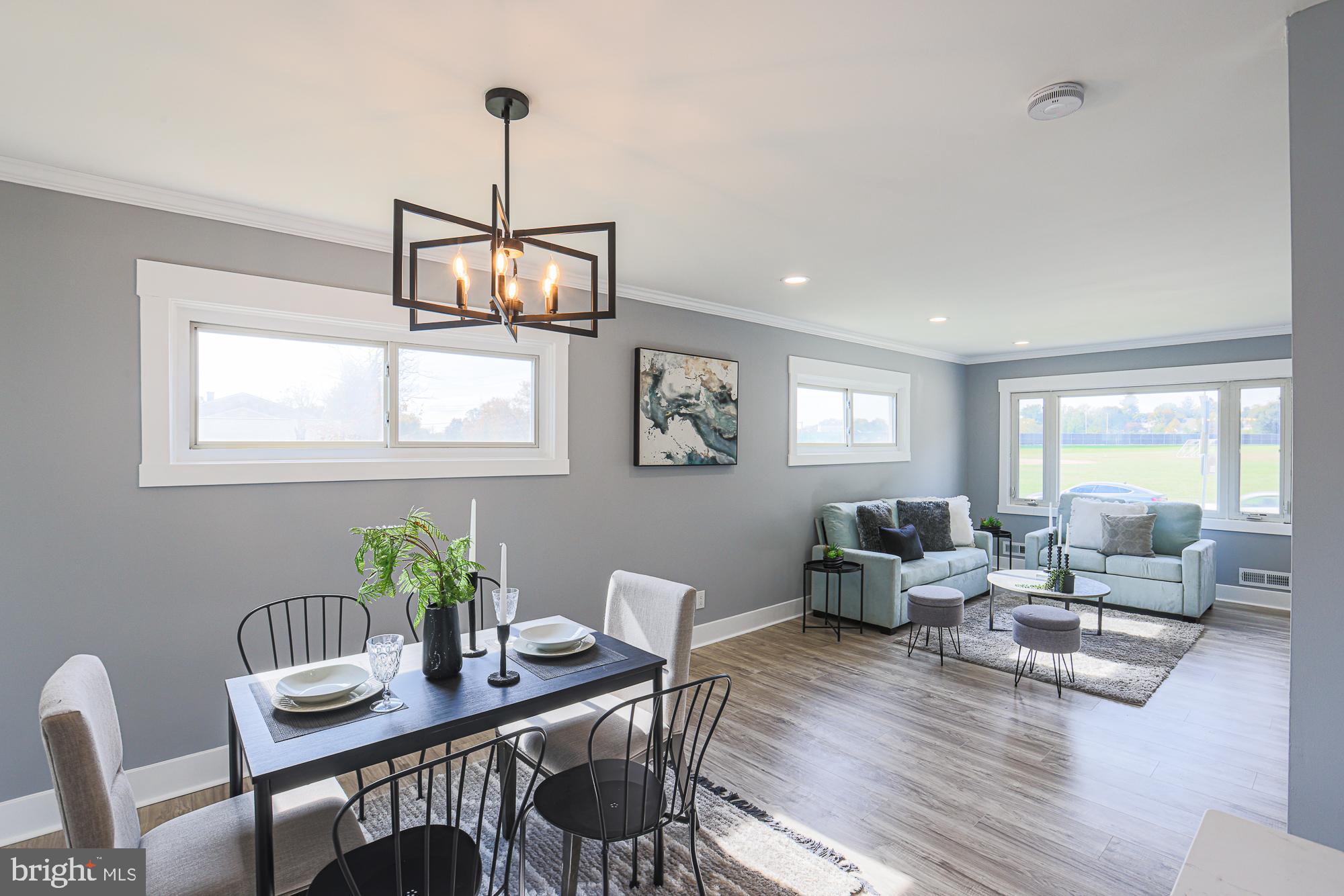 3715 Washington Avenue Baltimore, MD 21244 - Photo 17 of 57 a view of a dining room with furniture window and wooden floor