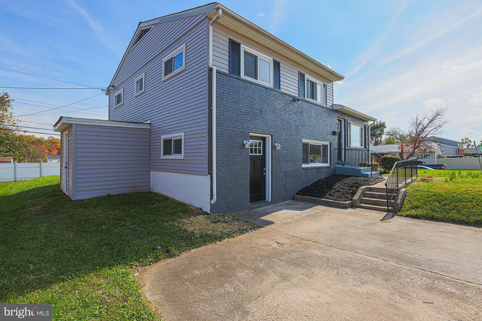 3715 Washington Avenue Baltimore, MD 21244 - Photo 2 of 57 a view of a house with a yard