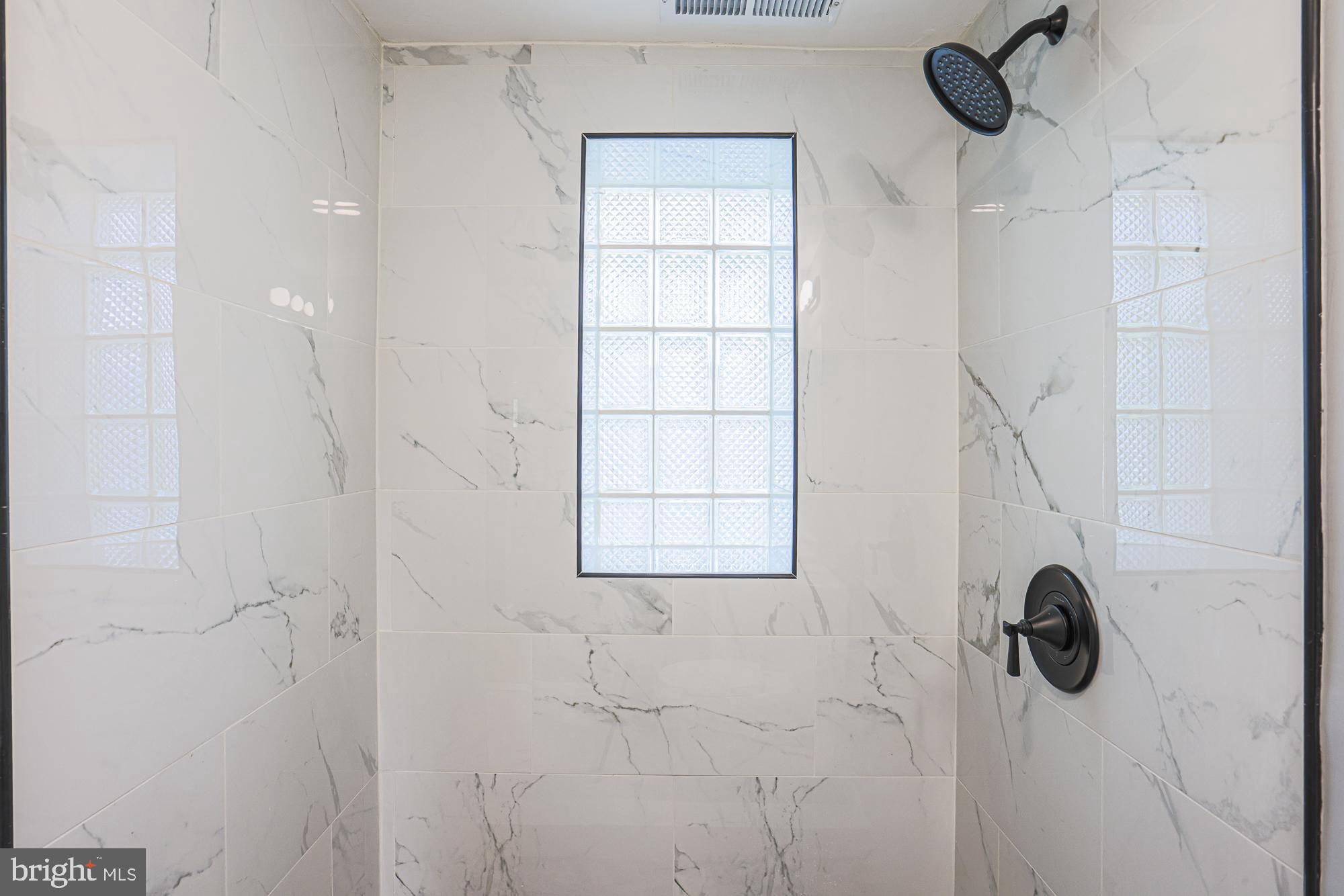 3715 Washington Avenue Baltimore, MD 21244 - Photo 34 of 57 a bathroom with a shower