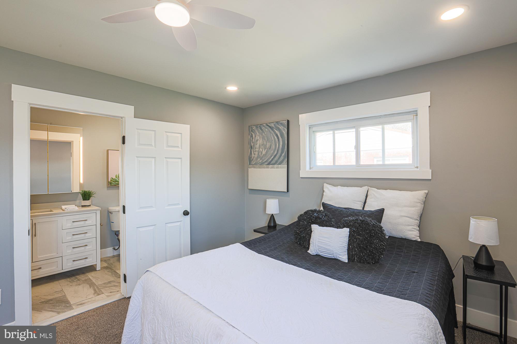 3715 Washington Avenue Baltimore, MD 21244 - Photo 47 of 57 a bed room with a bed and a tv