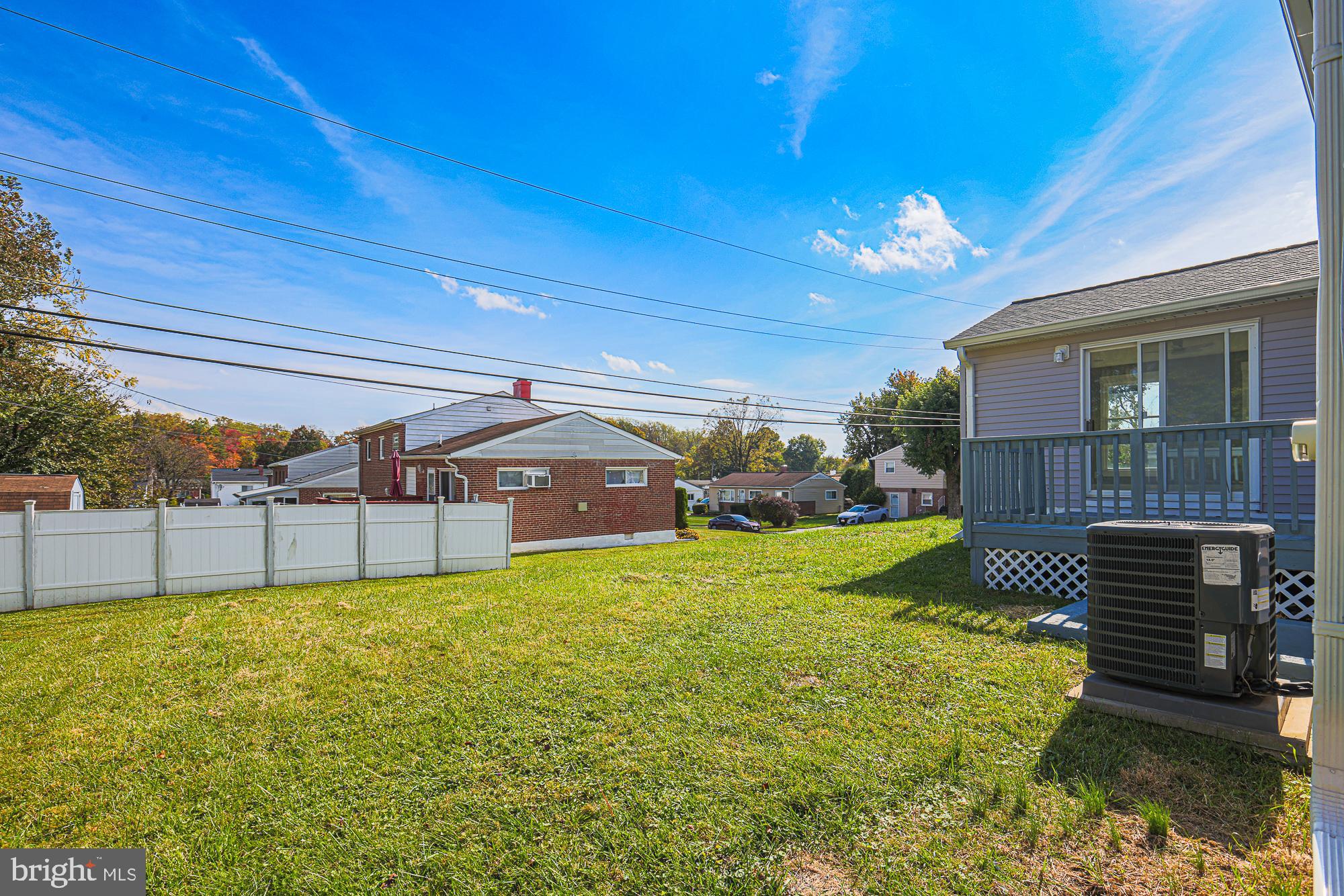 3715 Washington Avenue Baltimore, MD 21244 - Photo 50 of 57 a view of a house with a yard