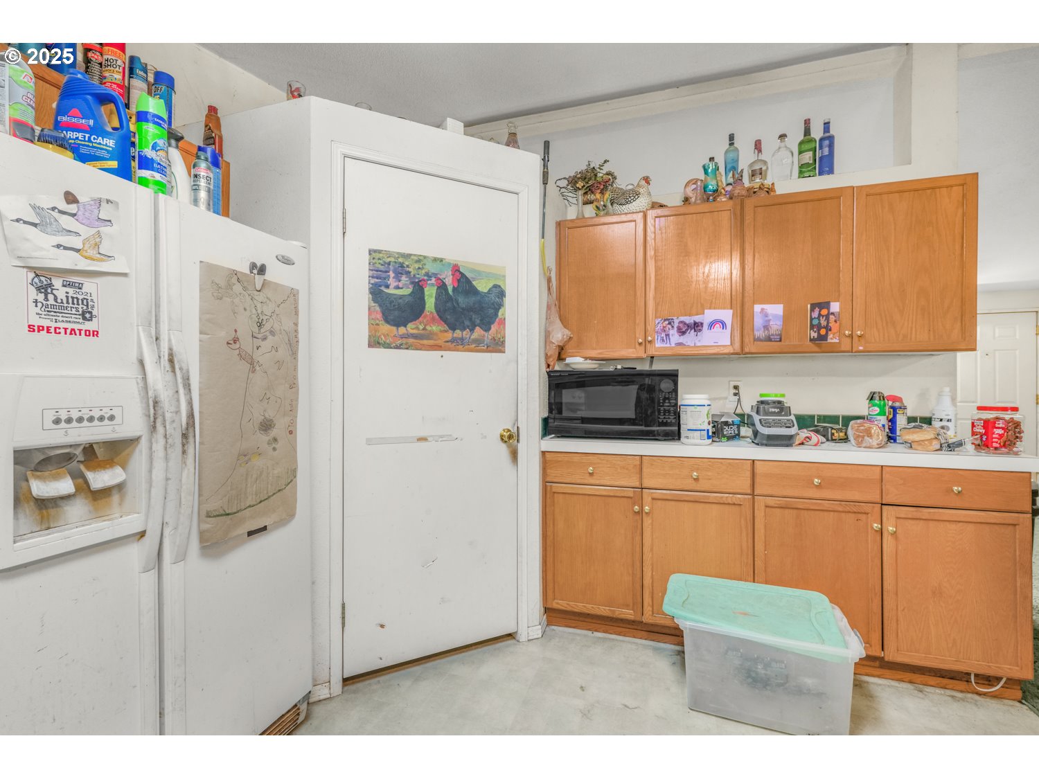 19807 Highway 211 Colton, OR 97017 - Photo 11 of 22 a kitchen with stainless steel appliances cabinets and a window