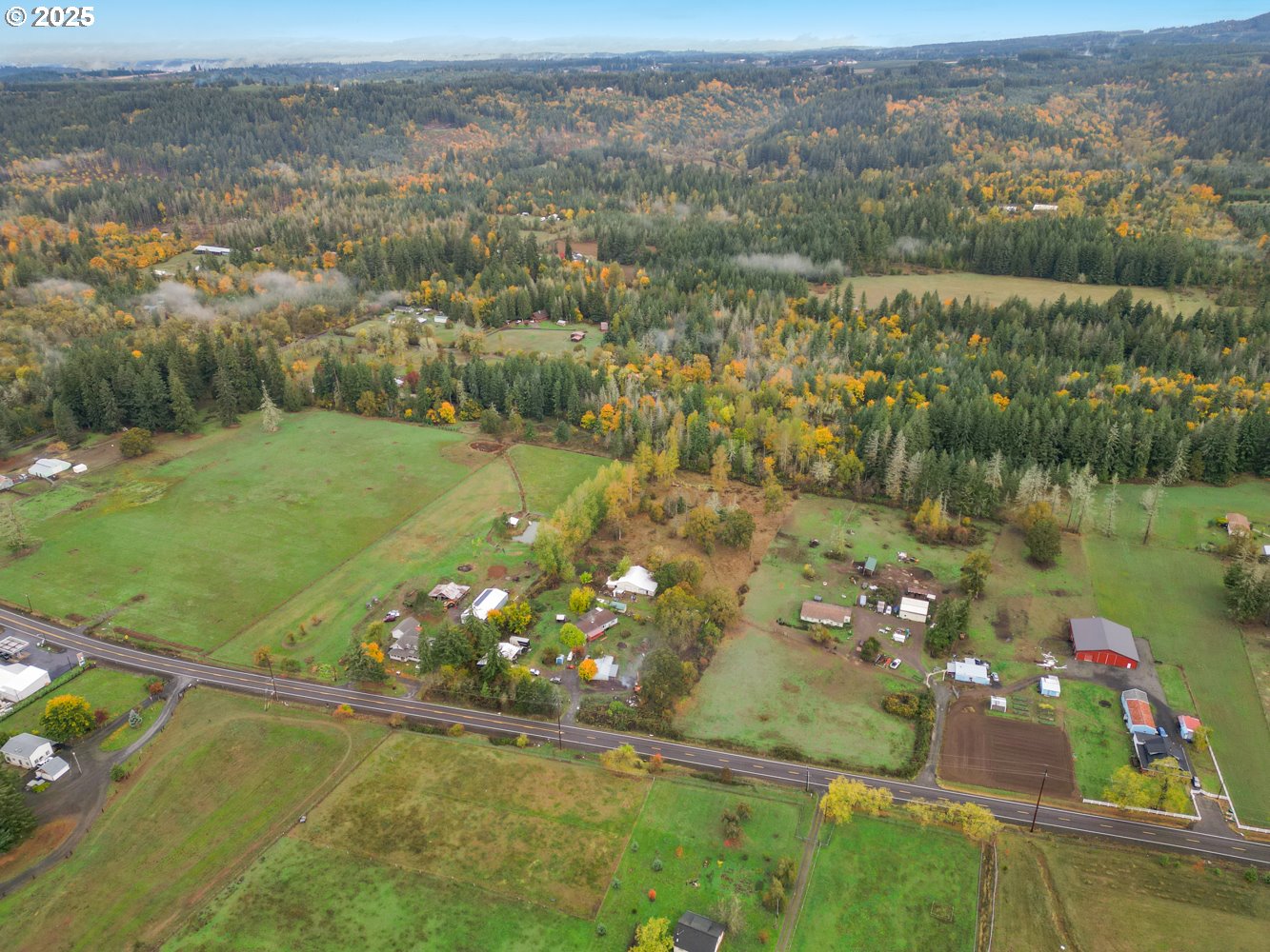 19807 Highway 211 Colton, OR 97017 - Photo 3 of 22 an aerial view of residential houses with outdoor space and river