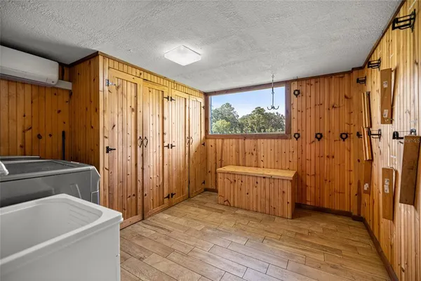 a view of a hallway with closet area