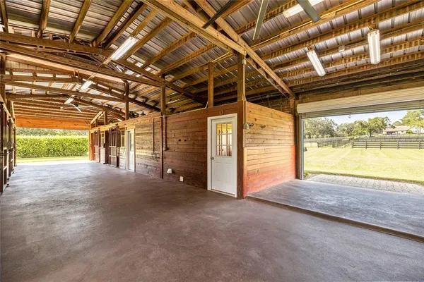 a view of an empty room with a balcony