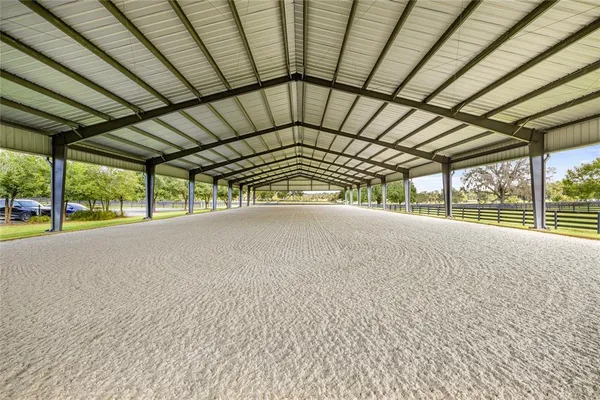 a view of an empty room with a balcony