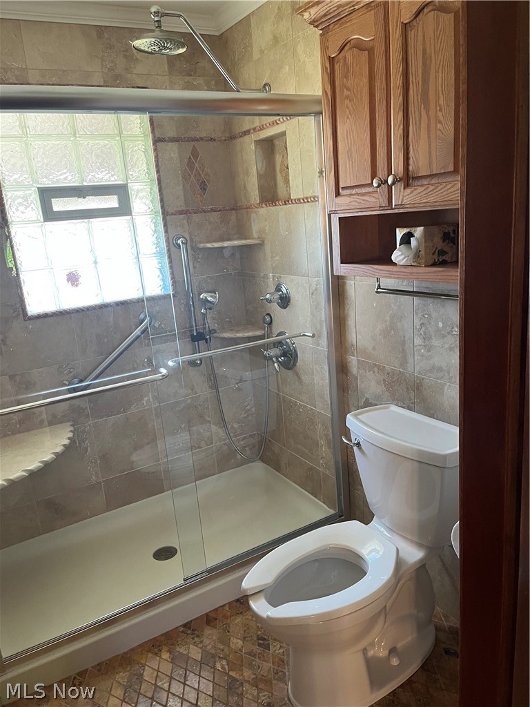 7254 Chestnut-Ridge Road Hubbard, OH 44425 - Photo 20 of 25 Bathroom featuring toilet, a shower with door, tile patterned flooring, and tile walls