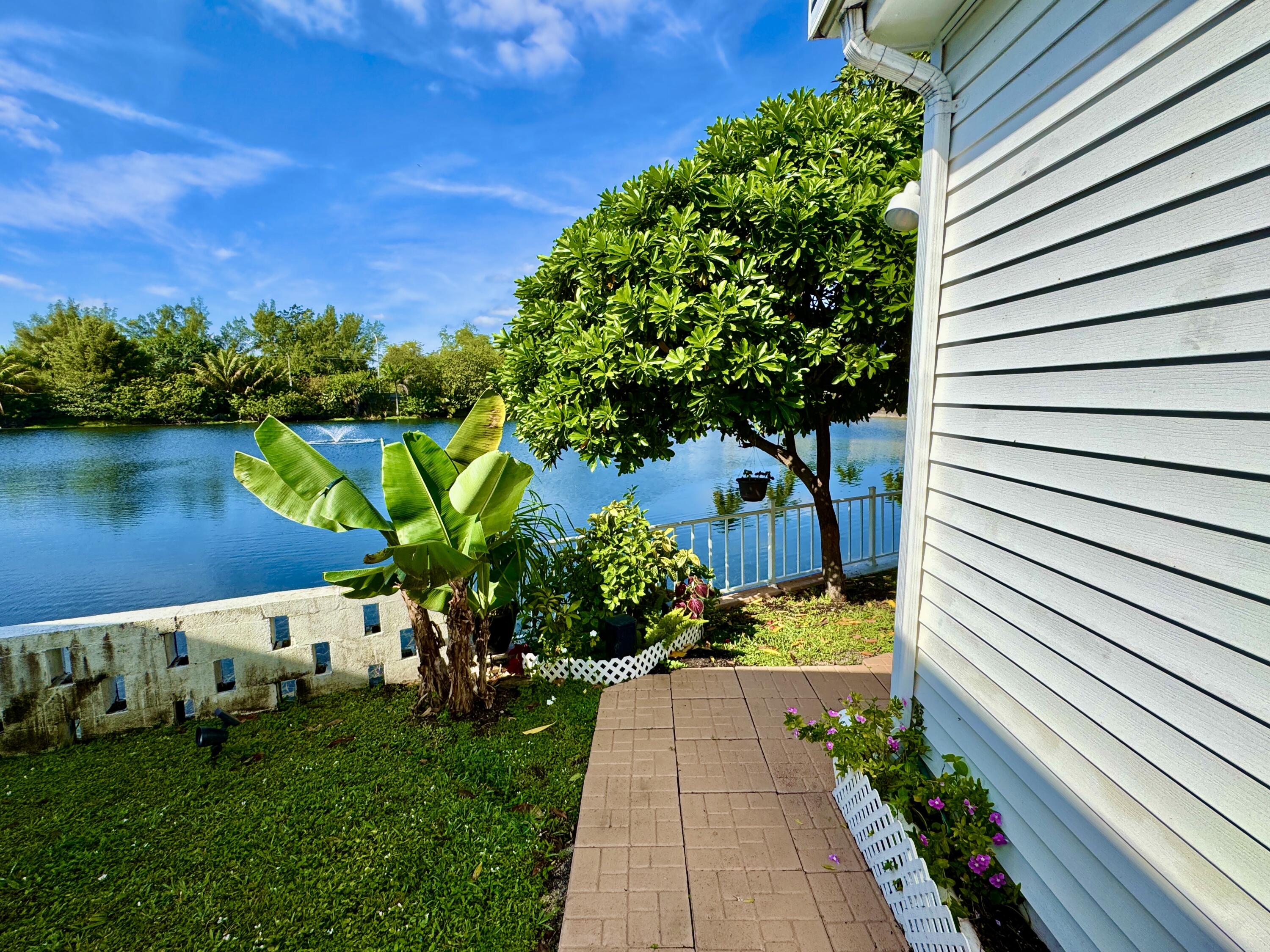 1324 South 33rd Road, Unit 1324 Hollywood, FL 33021 - Photo 14 of 23 a view of a garden with a pathway