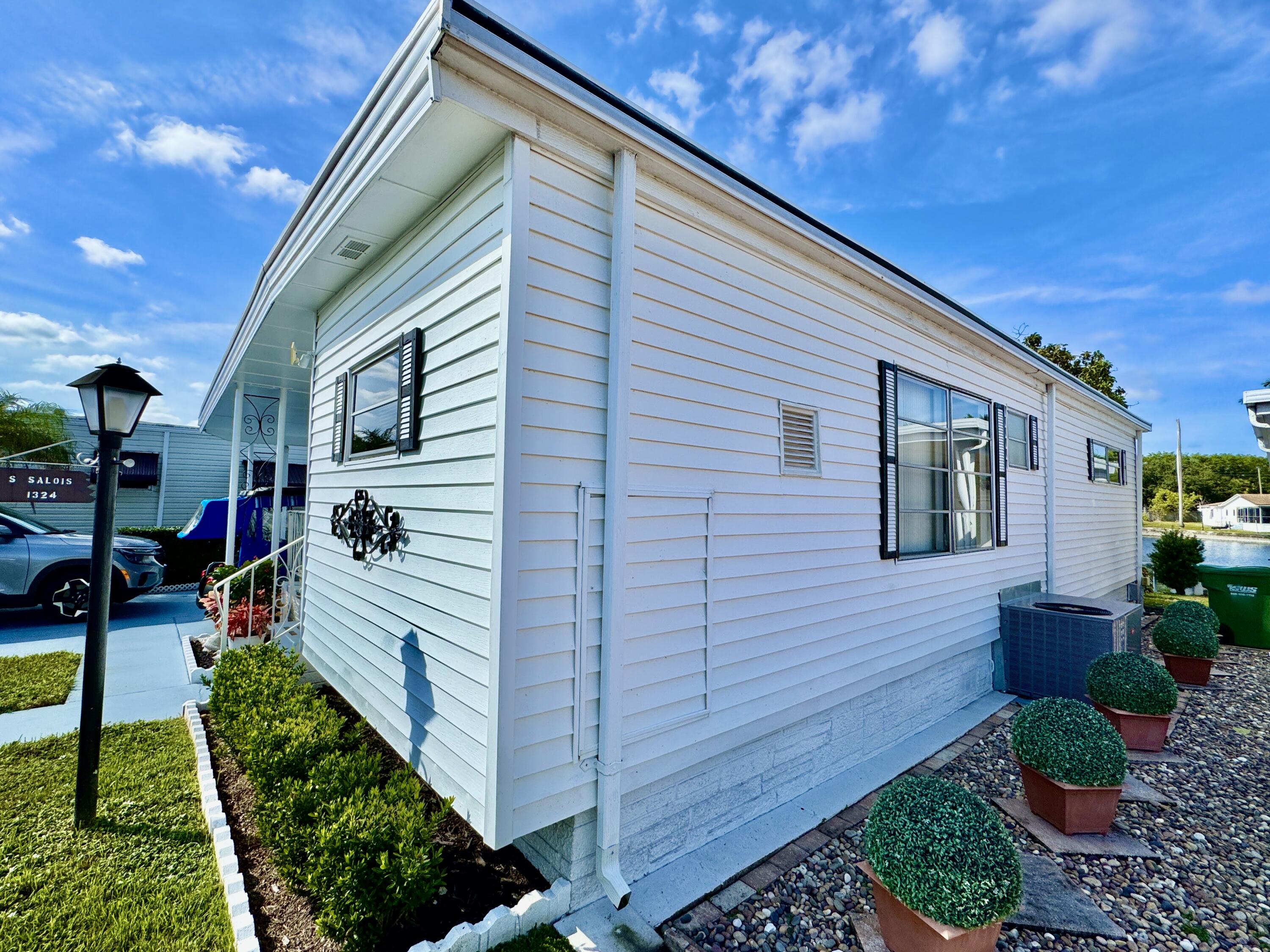 1324 South 33rd Road, Unit 1324 Hollywood, FL 33021 - Photo 16 of 23 a aerial view of a house with a yard