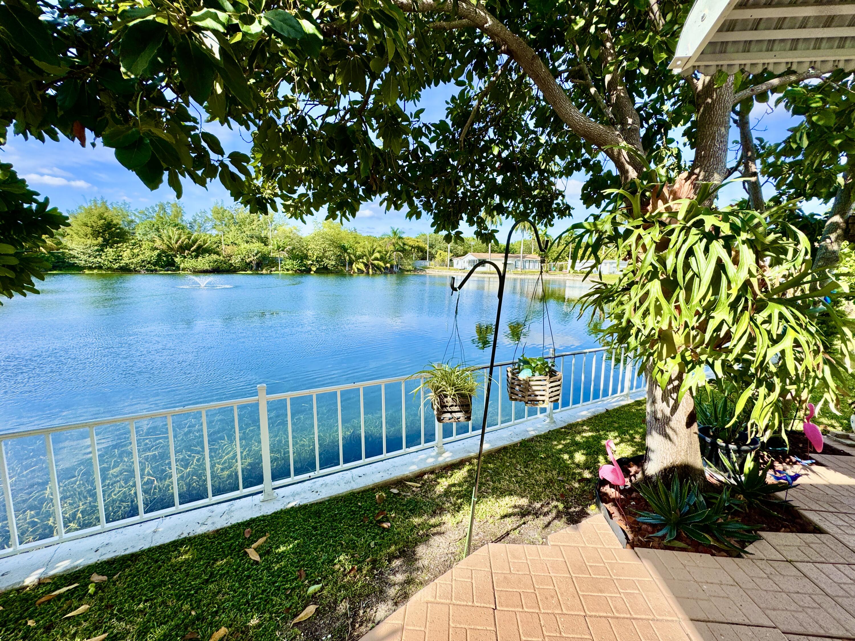 1324 South 33rd Road, Unit 1324 Hollywood, FL 33021 - Photo 20 of 23 a view of a house next to a yard