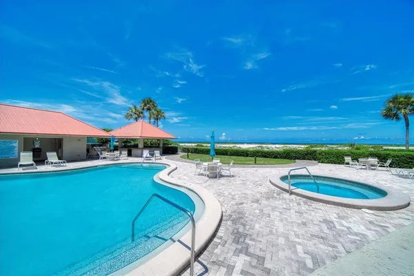 a view of a balcony with furniture