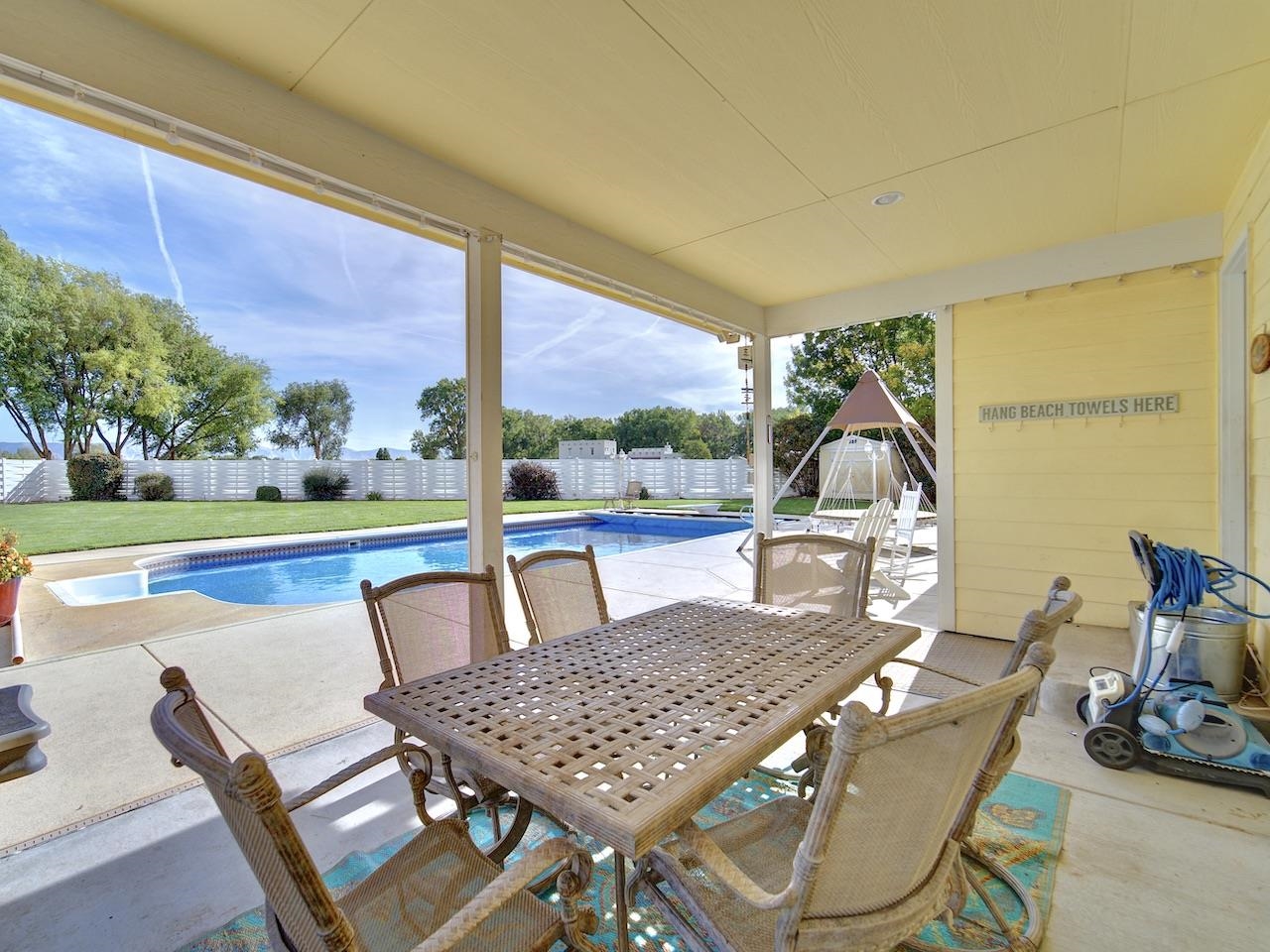 970 20 Road Fruita, CO 81521 - Photo 27 of 31 a view of an outdoor dining space with a table and chairs