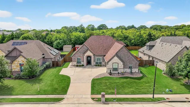an aerial view of a house with garden
