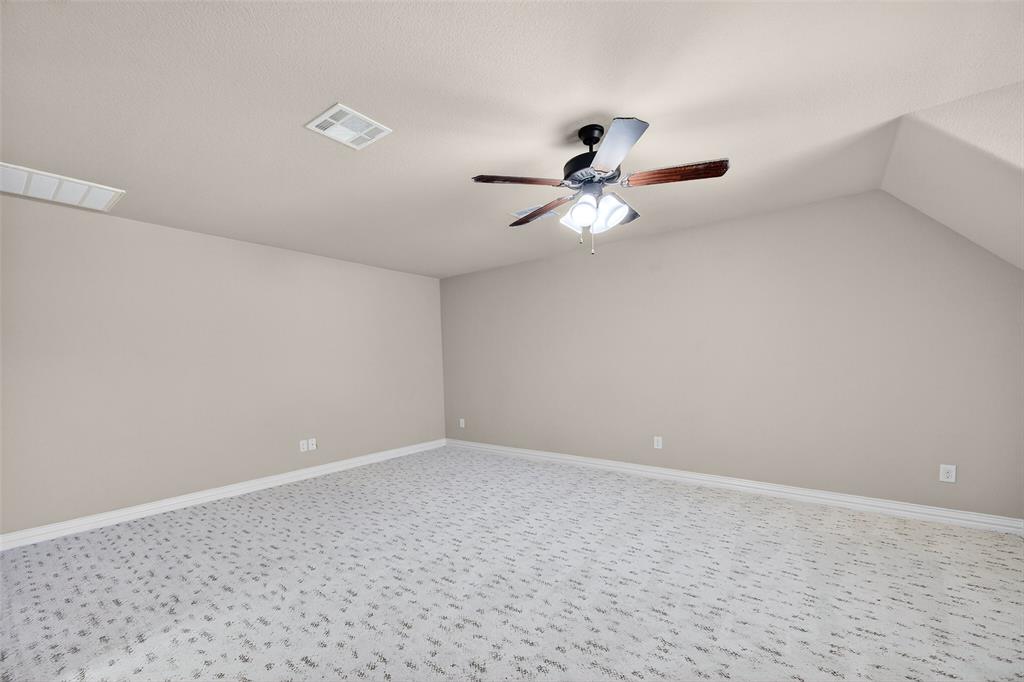 2420 Remuda Drive Sherman, TX 75092 - Photo 30 of 40 a view of a big room with a fan and a window