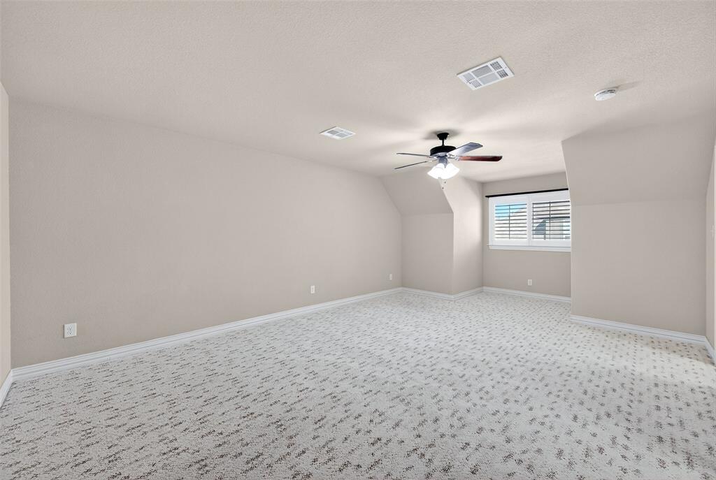 2420 Remuda Drive Sherman, TX 75092 - Photo 31 of 40 wooden floor in an empty room with a window