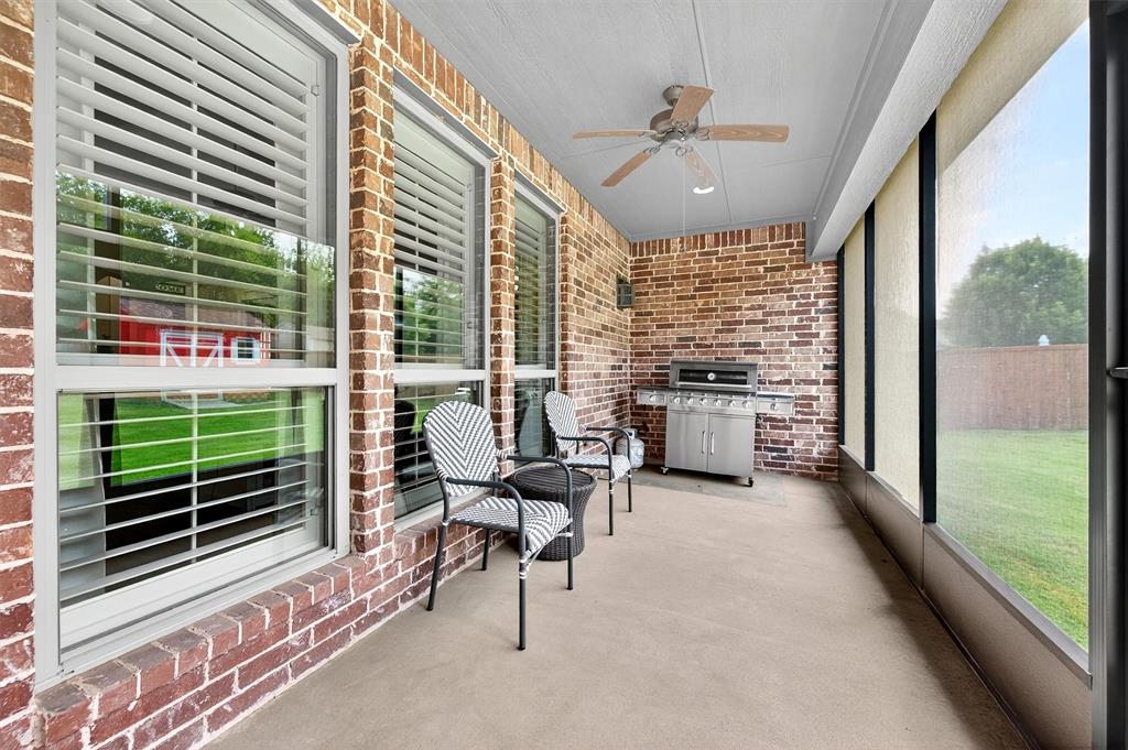 2420 Remuda Drive Sherman, TX 75092 - Photo 33 of 40 a living room filled with furniture and a large window