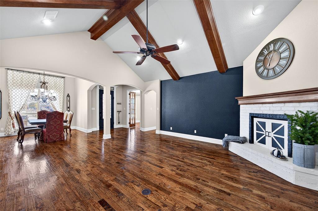 2420 Remuda Drive Sherman, TX 75092 - Photo 5 of 40 a view of a livingroom with furniture and a fireplace