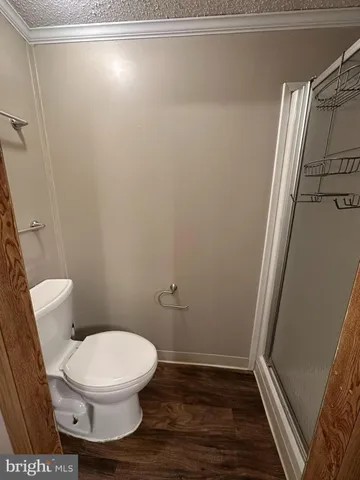 a bathroom with a toilet and a sink