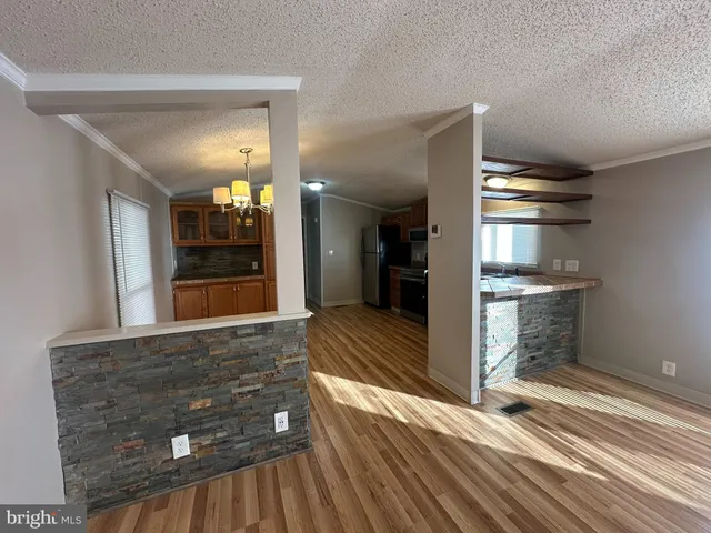 a view of kitchen and utility room