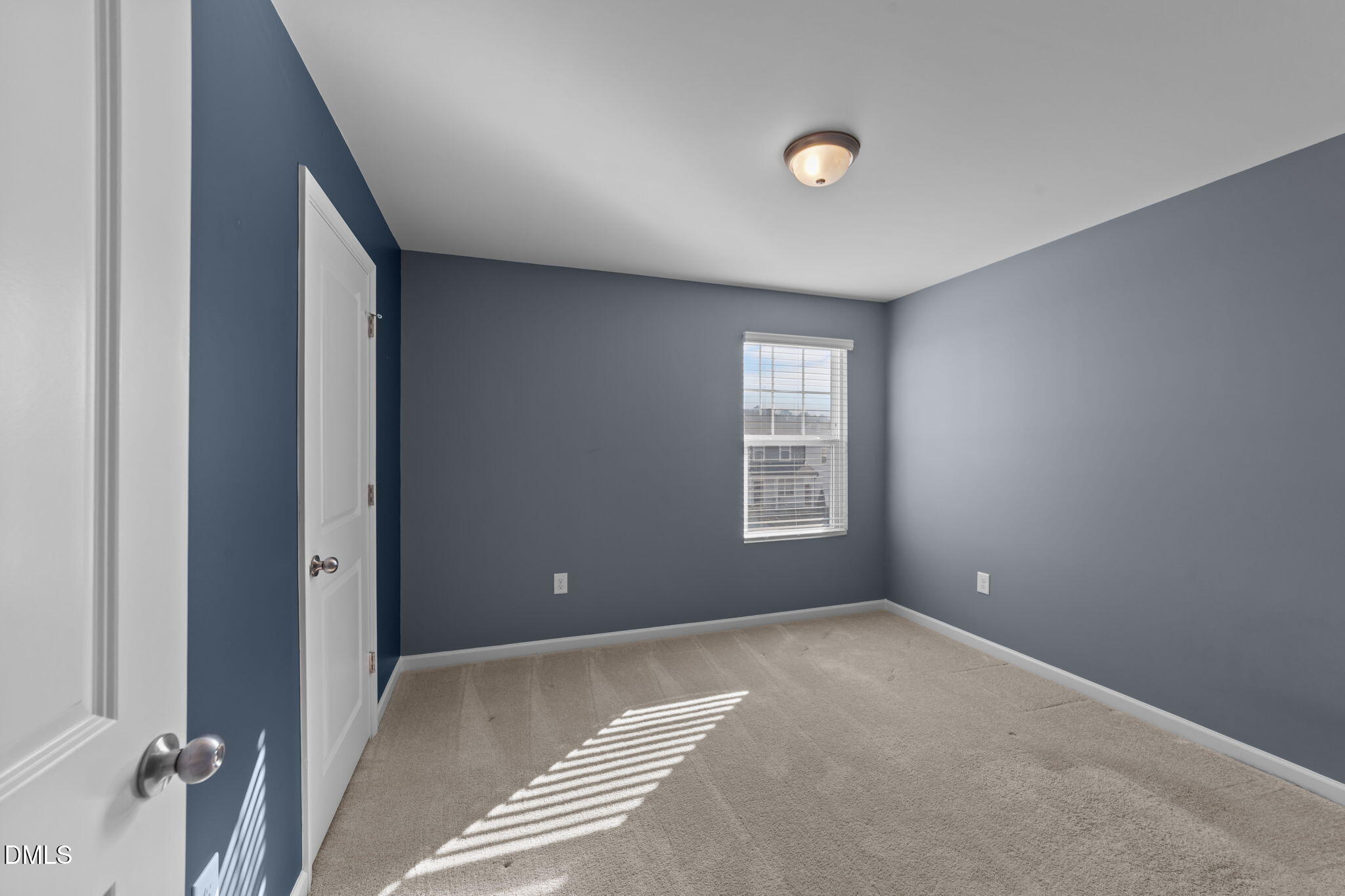 1421 Justice Union Court Raleigh, NC 27604 - Photo 16 of 21 an empty room with windows and closet