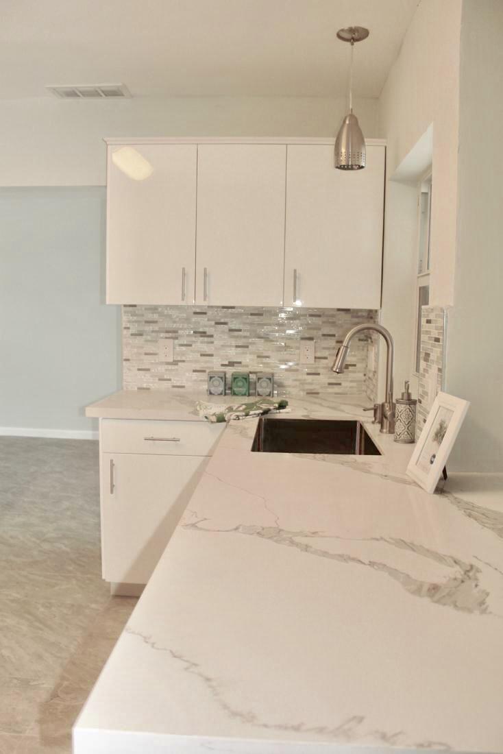 846 Northwest 7th Street Boca Raton, FL 33486 - Photo 13 of 19 a view of a kitchen counter top space