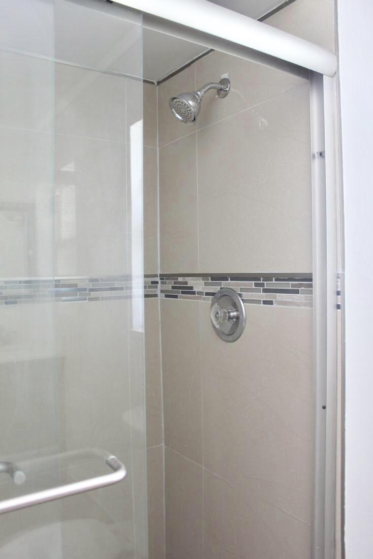 846 Northwest 7th Street Boca Raton, FL 33486 - Photo 19 of 19 a close view of a shower in bathroom