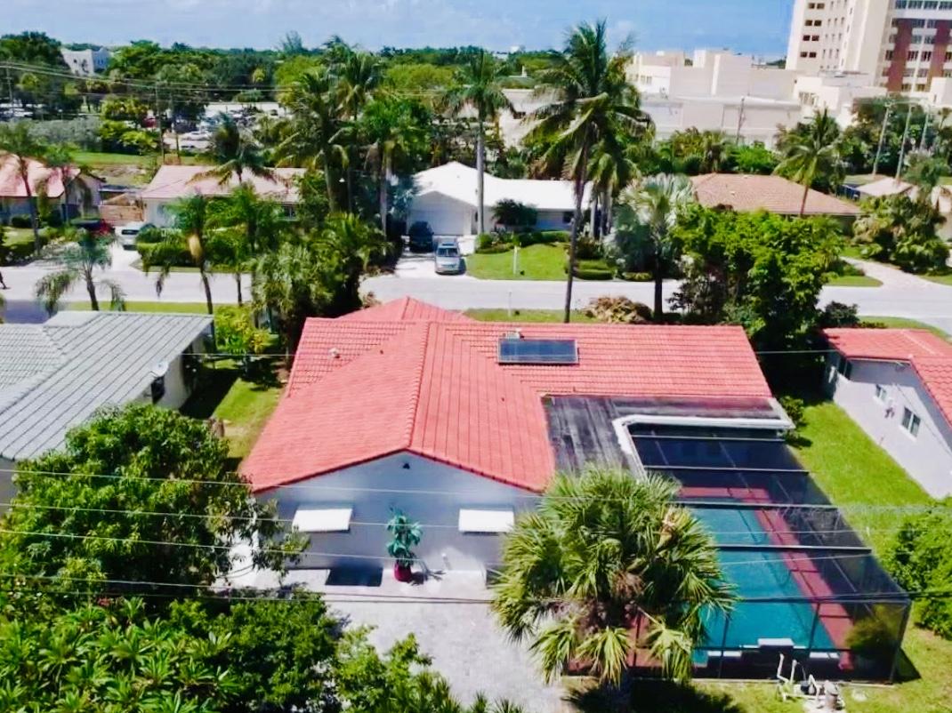 846 Northwest 7th Street Boca Raton, FL 33486 - Photo 3 of 19 an aerial view of a house with yard swimming pool and outdoor seating