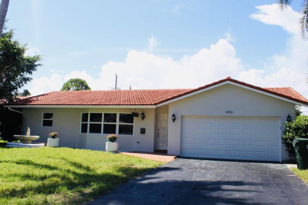 846 Northwest 7th Street Boca Raton, FL 33486 - Photo 5 of 19 a view of a house with backyard and porch