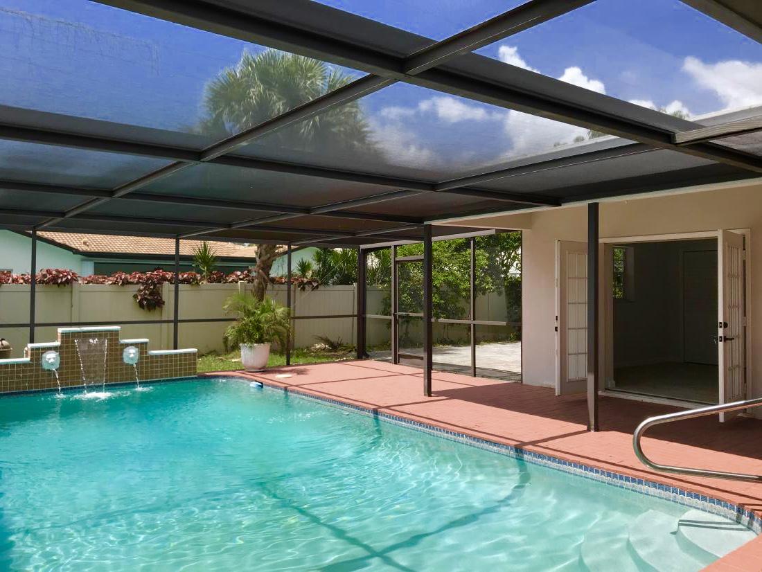 846 Northwest 7th Street Boca Raton, FL 33486 - Photo 7 of 19 a view of a gym with a swimming pool