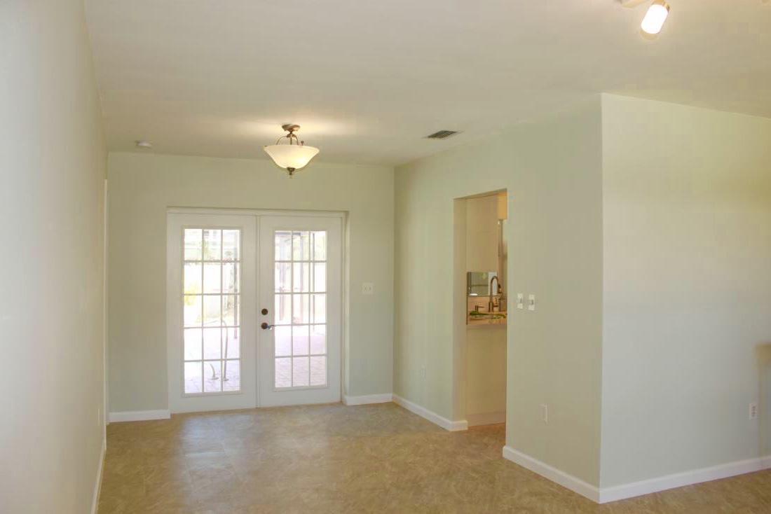 846 Northwest 7th Street Boca Raton, FL 33486 - Photo 10 of 19 a view of an empty room with a window