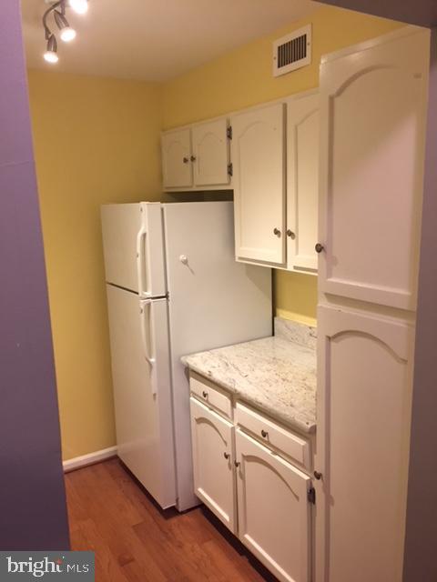 5800 Cove Landing Road, Unit 303 Burke, VA 22015 - Photo 10 of 25 updated kitchen, hw floors