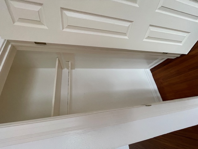 2104 Enfield Road, Unit A Austin, TX 78703 - Photo 3 of 13 a view of walk in closet with wooden floor