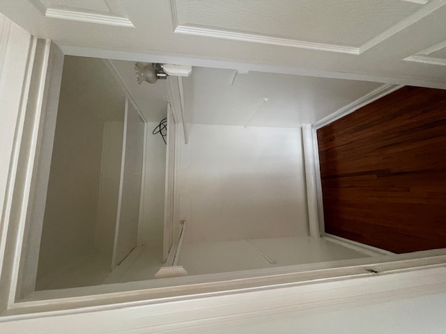 2104 Enfield Road, Unit A Austin, TX 78703 - Photo 7 of 13 a view of a closet with wooden floor