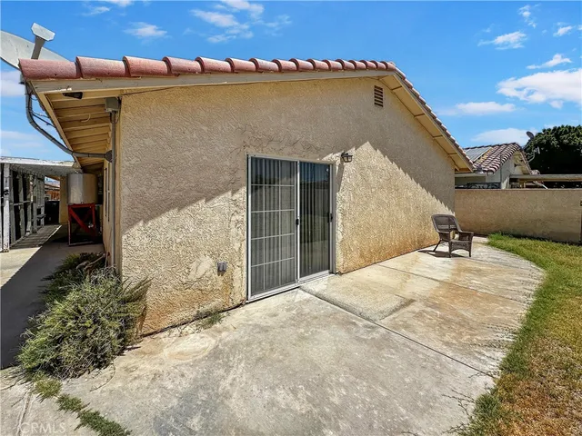 a view of a building with wooden floor and wooden fence