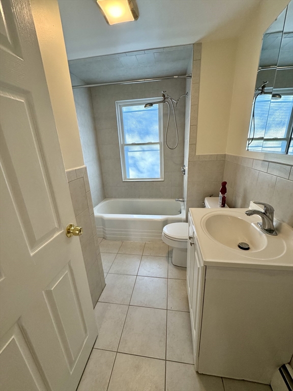 40 Gardner Street, Unit 1 Boston, MA 02132 - Photo 8 of 8 a bathroom with a sink a toilet and shower