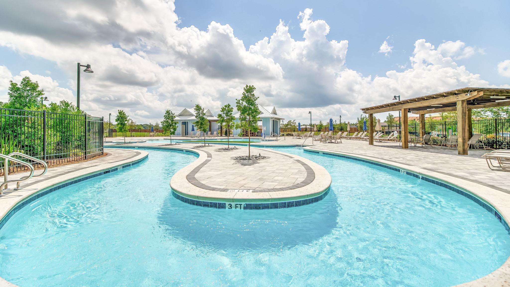 8029 Fir Tree Drive Milton, FL 32583 - Photo 30 of 41 a view of a swimming pool is in the backyard of a house