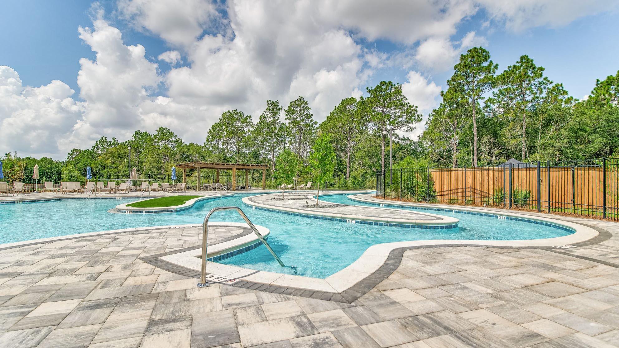 8029 Fir Tree Drive Milton, FL 32583 - Photo 31 of 41 a view of a swimming pool with a yard